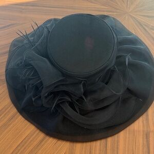 Elegant Black Women's Wide-Brim Dress Hat
Derby style